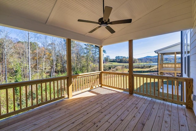 wooden terrace with ceiling fan