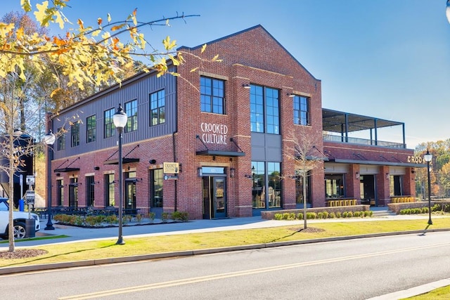 multi unit property featuring brick siding