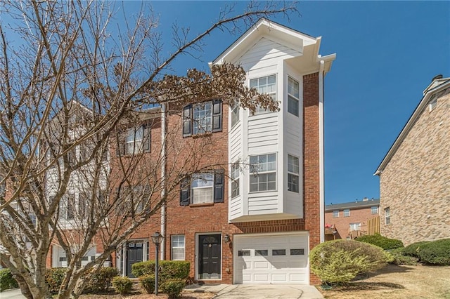 2164 Mill Garden Run, Buford, GA 30519 - multi unit property with an attached garage, concrete driveway, and brick siding