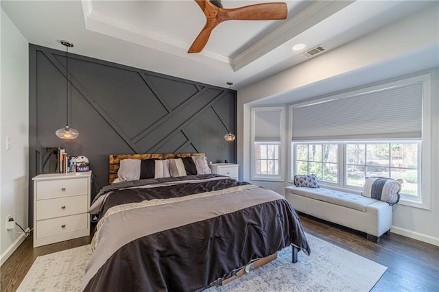 2164 Mill Garden Run, Buford, GA 30519 - bedroom featuring baseboards, visible vents, a tray ceiling, ceiling fan, and wood finished floors