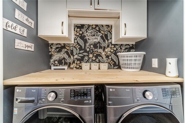 2164 Mill Garden Run, Buford, GA 30519 - washroom featuring washer and dryer and cabinet space