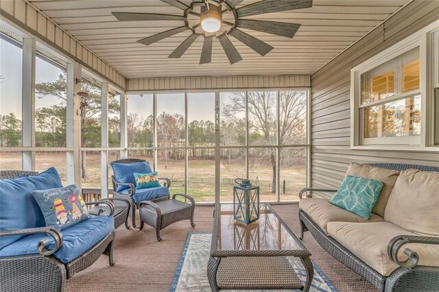 sunroom / solarium with ceiling fan