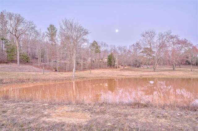 view of landscape with a water view