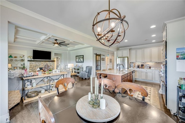 4578 Big Rock Ridge Trl, Gainesville, GA 30504 - dining area with a ceiling fan, a fireplace, a barn door, recessed lighting, and a chandelier
