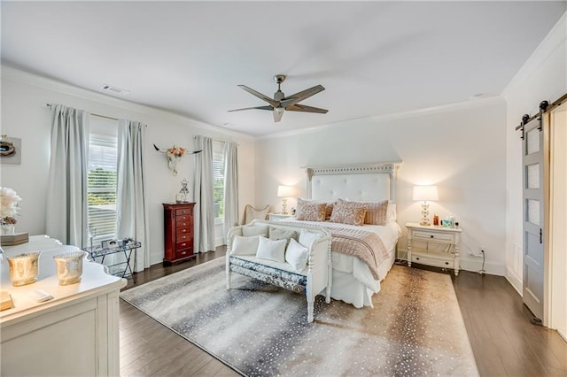 4578 Big Rock Ridge Trl, Gainesville, GA 30504 - bedroom with a barn door, ornamental molding, wood finished floors, and a ceiling fan