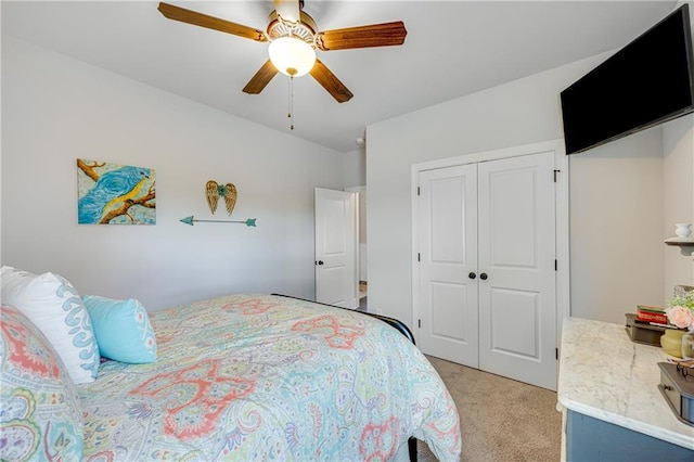 4578 Big Rock Ridge Trl, Gainesville, GA 30504 - bedroom featuring light carpet, a closet, and a ceiling fan