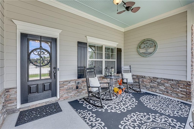 4578 Big Rock Ridge Trl, Gainesville, GA 30504 - doorway to property featuring covered porch, stone siding, and ceiling fan
