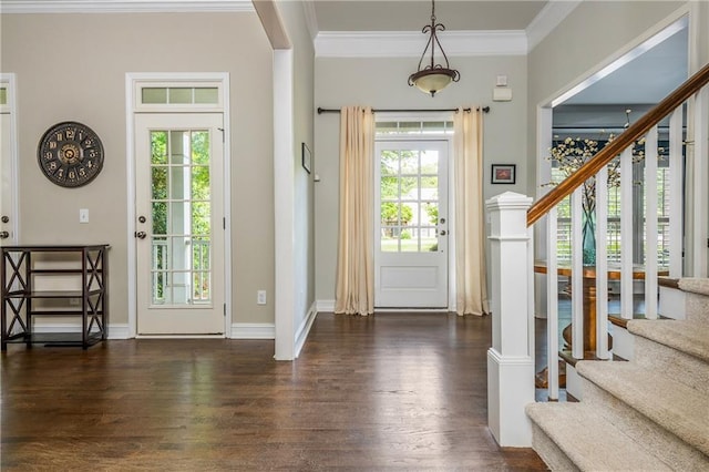 entrance foyer with wood finished floors, stairway, crown molding, and baseboards