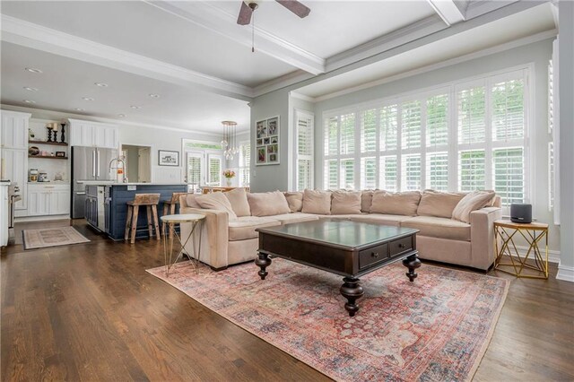 living area with dark wood-style floors, ceiling fan, beam ceiling, recessed lighting, and crown molding