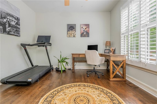 office space featuring wood finished floors and baseboards