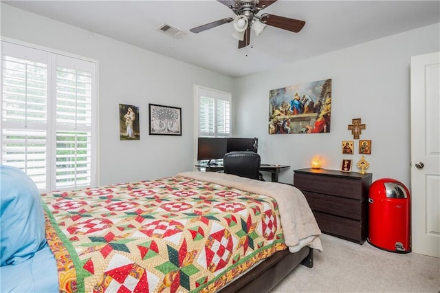 bedroom featuring carpet floors and a ceiling fan