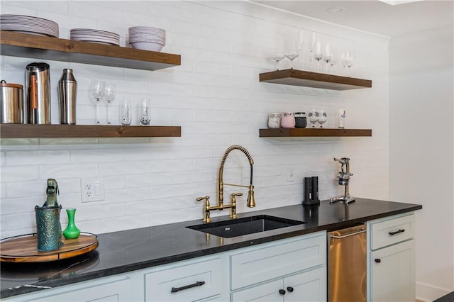 indoor wet bar featuring tasteful backsplash
