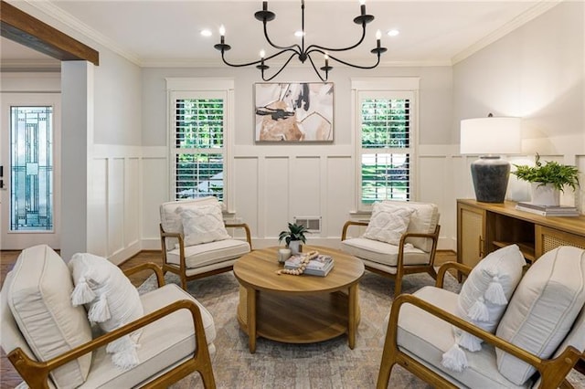 sitting room featuring a chandelier, crown molding, light hardwood / wood-style flooring, and sink