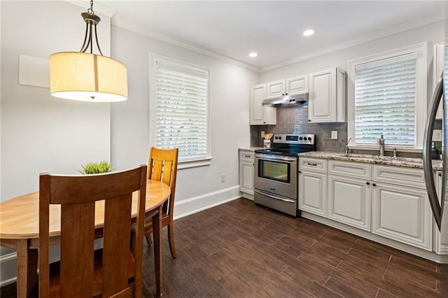 kitchen with white cabinetry, appliances with stainless steel finishes, decorative backsplash, light stone countertops, and pendant lighting