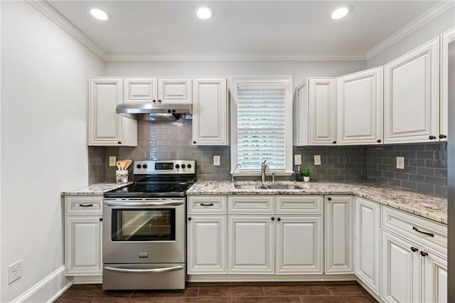 kitchen featuring white cabinets, electric range, sink, and light stone counters