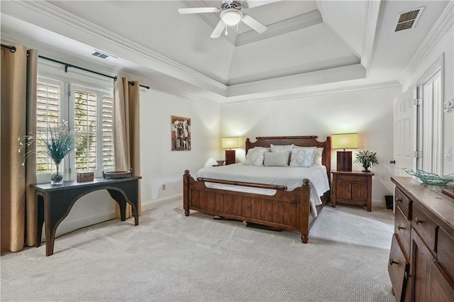bedroom with baseboards, visible vents, and light colored carpet
