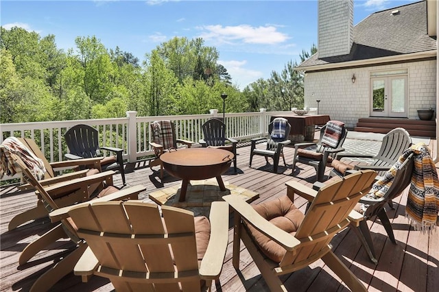 deck featuring french doors and an outdoor living space