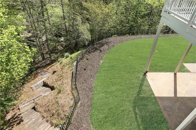 view of yard with fence and a patio area