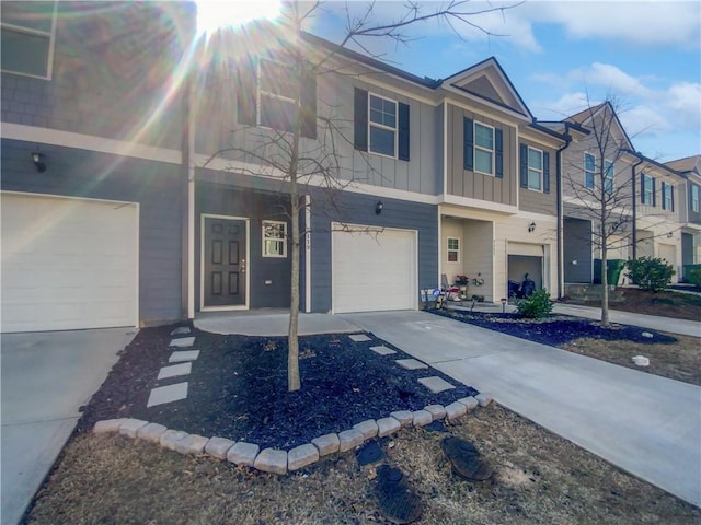 multi unit property featuring a garage