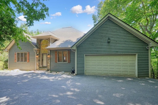 view of front of property featuring a garage