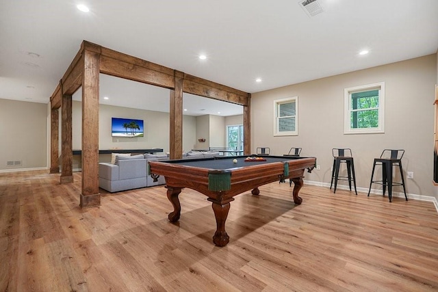 game room featuring light hardwood / wood-style flooring, a healthy amount of sunlight, and pool table