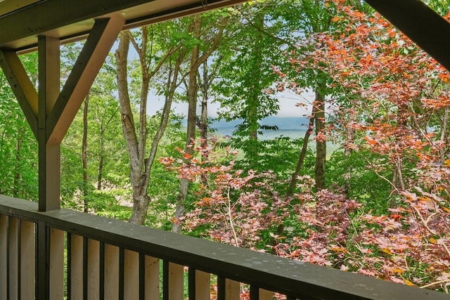 balcony featuring a water view