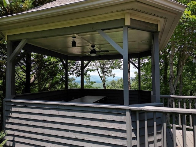 exterior space featuring a gazebo and ceiling fan