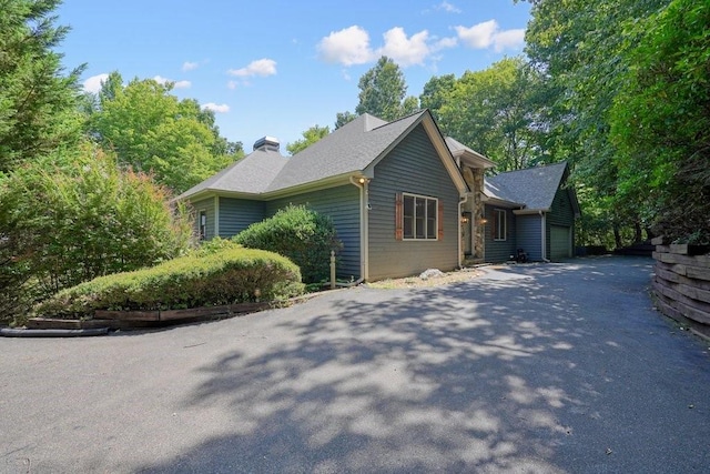 view of home's exterior with a garage