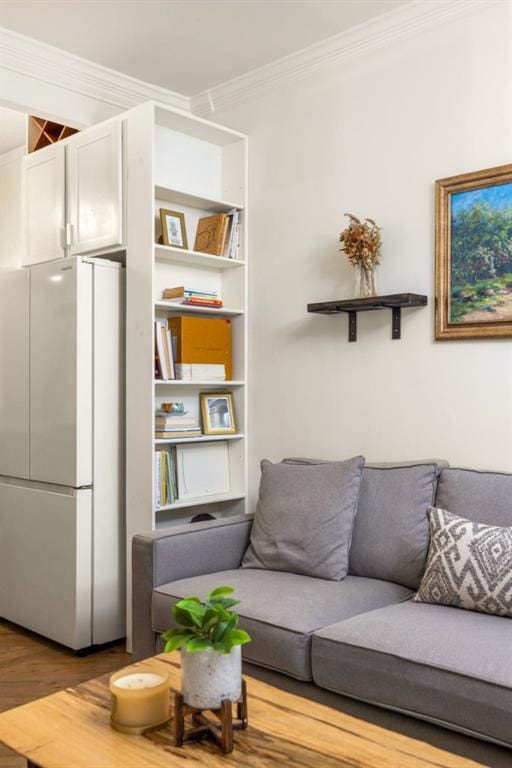 living room featuring wood finished floors and ornamental molding