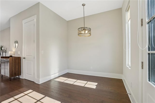 264 Castleberry Station Dr SW, Atlanta, GA 30313 - unfurnished room with baseboards and hardwood / wood-style floors