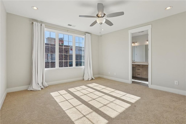 264 Castleberry Station Dr SW, Atlanta, GA 30313 - unfurnished bedroom with baseboards, visible vents, carpet flooring, and recessed lighting
