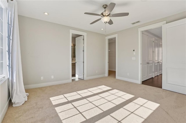 264 Castleberry Station Dr SW, Atlanta, GA 30313 - unfurnished bedroom with carpet floors, recessed lighting, visible vents, connected bathroom, and baseboards