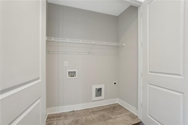 264 Castleberry Station Dr SW, Atlanta, GA 30313 - laundry area with hookup for a washing machine, laundry area, wood finished floors, baseboards, and electric dryer hookup
