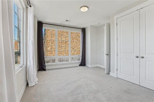 264 Castleberry Station Dr SW, Atlanta, GA 30313 - carpeted spare room featuring visible vents and baseboards