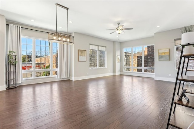 264 Castleberry Station Dr SW, Atlanta, GA 30313 - unfurnished living room with recessed lighting, dark wood finished floors, baseboards, and ceiling fan