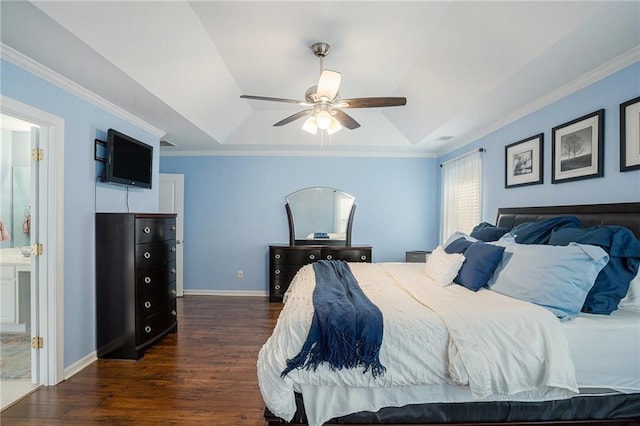 bedroom featuring crown molding, dark wood-style flooring, baseboards, and a raised ceiling