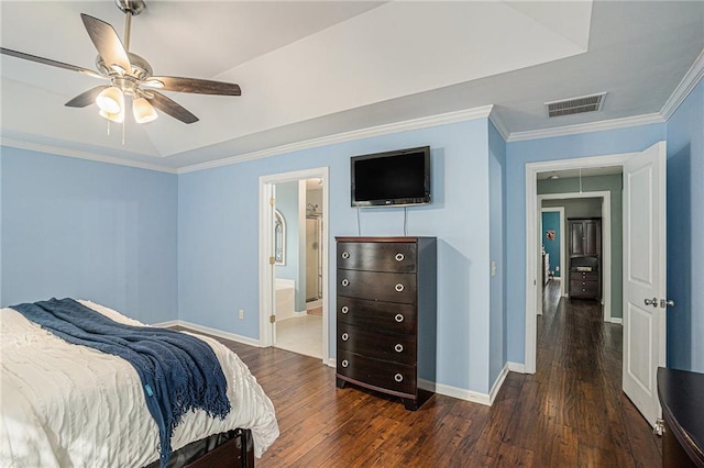 bedroom with crown molding, hardwood / wood-style floors, a ceiling fan, baseboards, and visible vents