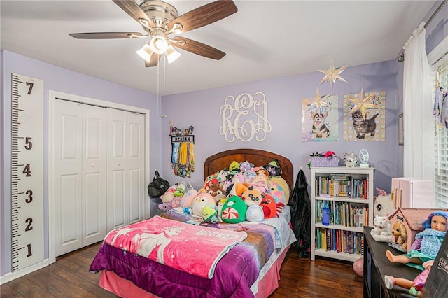 bedroom with a closet, ceiling fan, and hardwood / wood-style floors