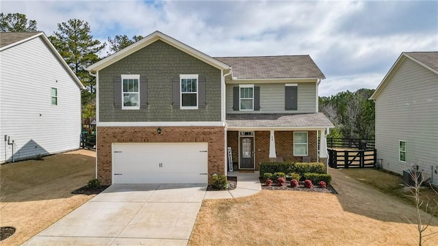 view of front of house with driveway, an attached garage, fence, central air condition unit, and brick siding