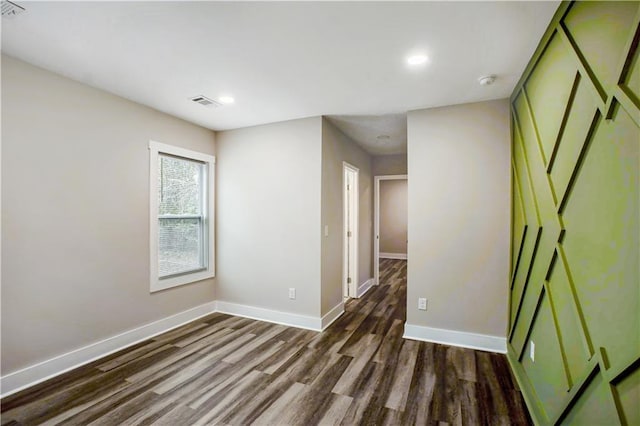 439 Bussey Ave, Thomson, GA 30824 - spare room featuring wood finished floors, recessed lighting, and a smoke detector