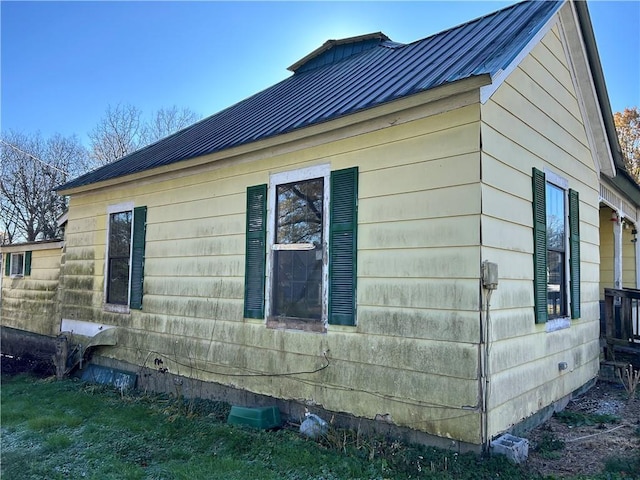 405 Magnolia St, La Fayette, GA 30728 - view of property exterior featuring metal roof, a standing seam roof, and crawl space