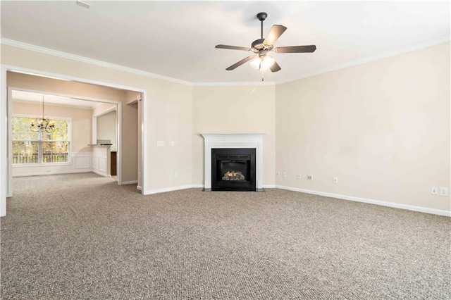 unfurnished living room featuring crown molding, carpet flooring, and ceiling fan with notable chandelier