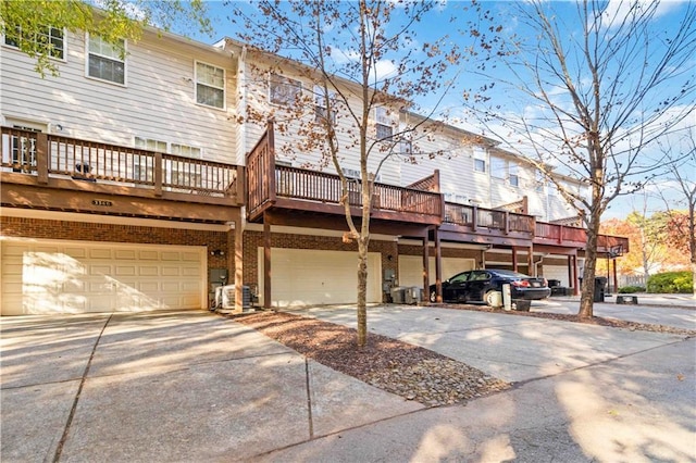 back of property featuring a garage