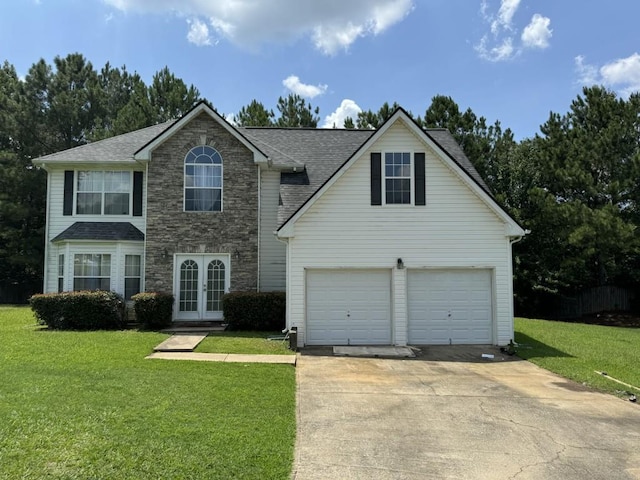 view of front facade featuring a garage and a front lawn