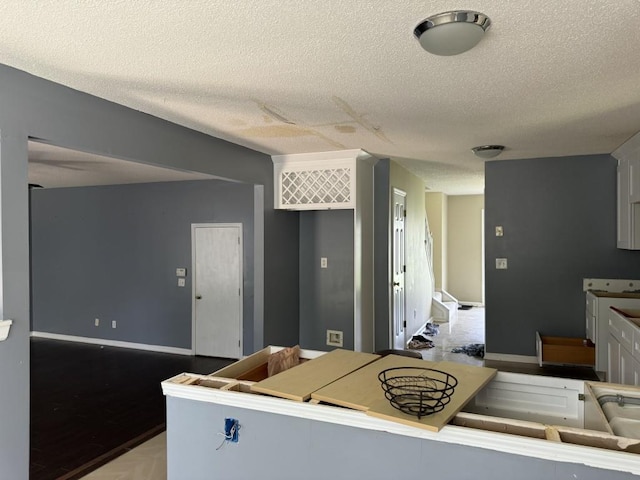 kitchen with a textured ceiling