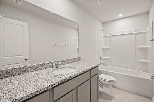 full bathroom featuring tile patterned flooring, vanity, toilet, and shower / bath combination