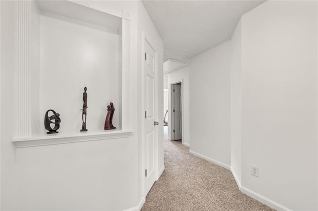 2826 Snapfinger Mnr, Decatur, GA 30035 - corridor with baseboards, carpet, and a textured ceiling