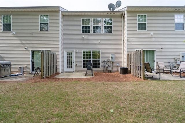 2826 Snapfinger Mnr, Decatur, GA 30035 - rear view of property featuring a yard, a patio, cooling unit, and fence