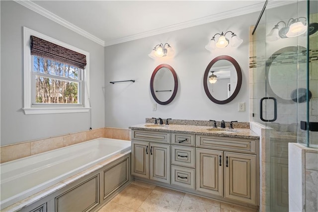 full bath with double vanity, ornamental molding, a sink, a shower stall, and a bath