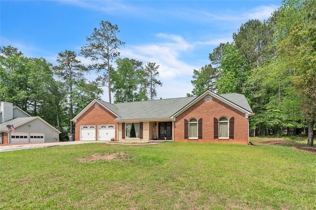 ranch-style home featuring concrete driveway, brick siding, an attached garage, and a front lawn